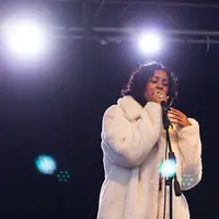 a musician sings during colorcon 2022